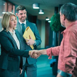 a man meeting with lawyers