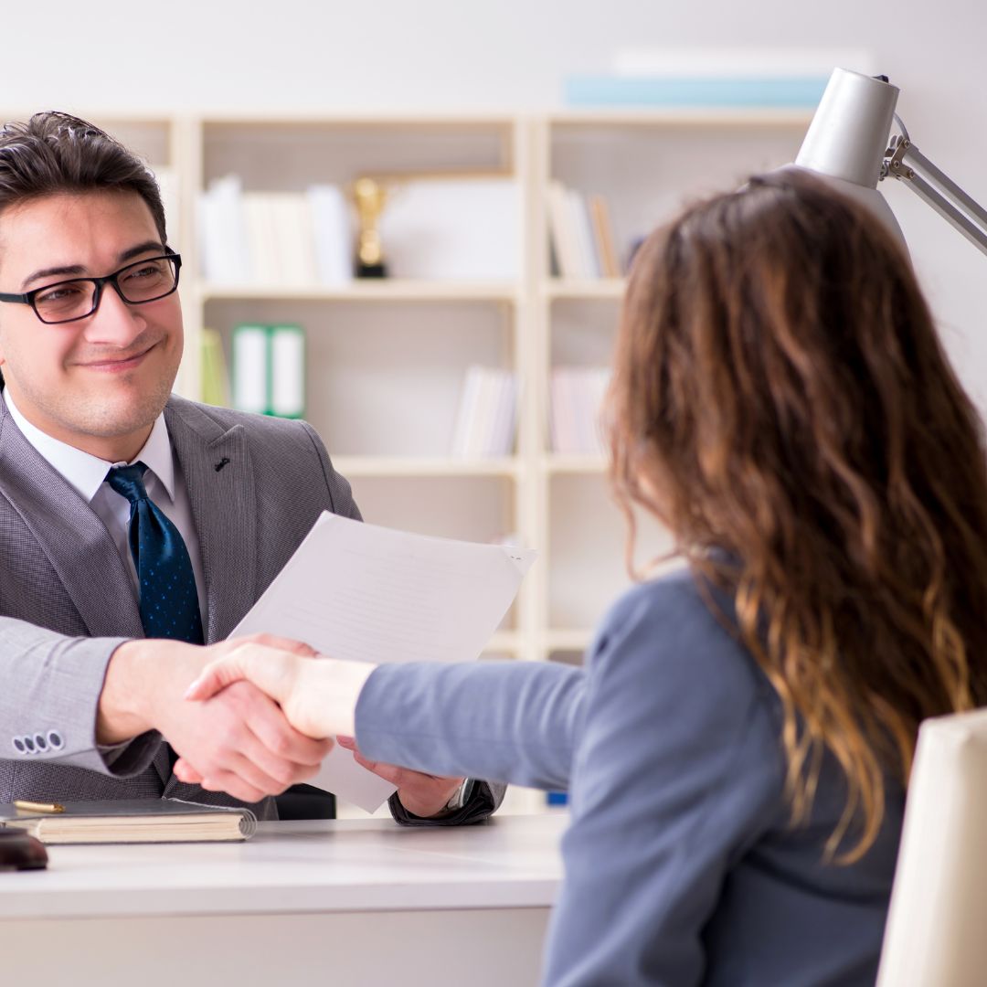 Lawyer and client shaking hands
