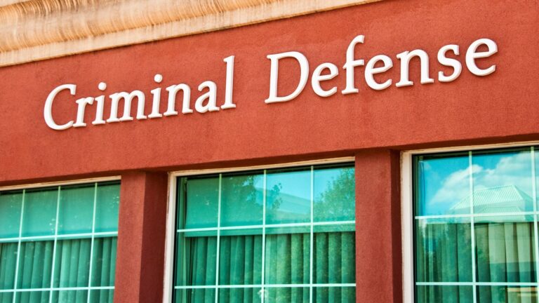 criminal defense sign on building
