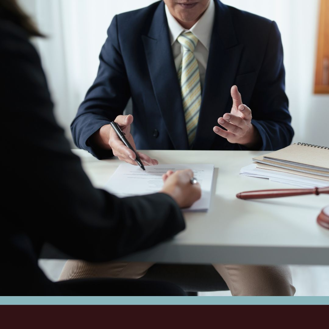 A lawyer speaking to a client
