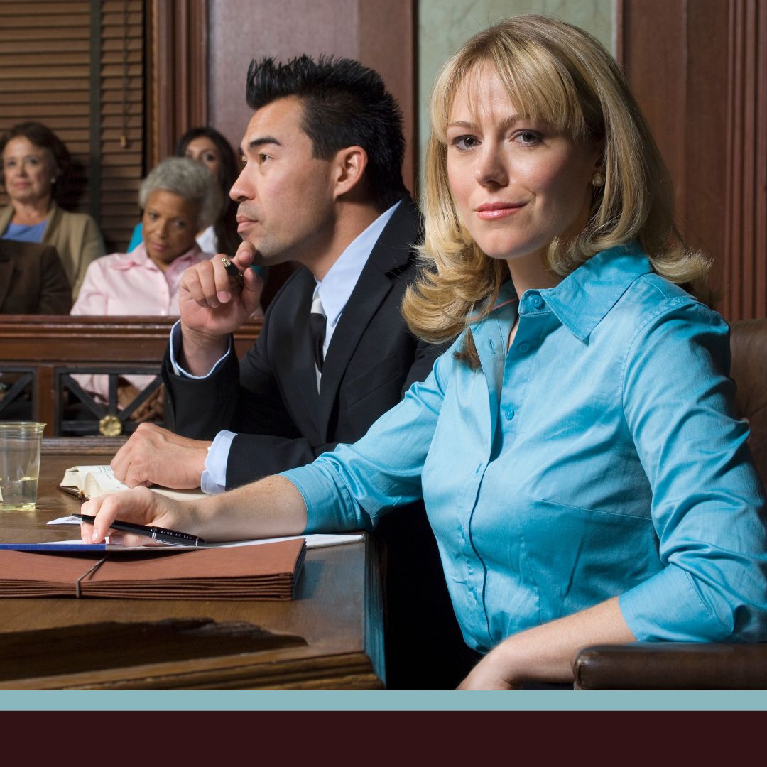 A lawyer and a client in a courtroom